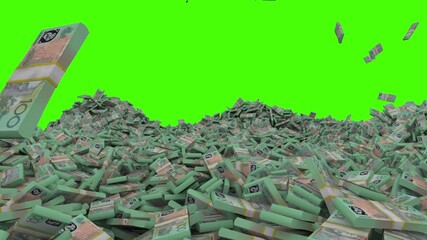 stack of australian dollar bills falls in giant australian pile of money
