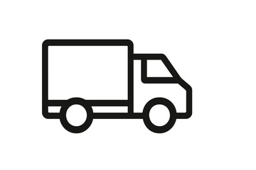 Delivery truck navigating city streets during daytime hours with a focus on transport and logistics