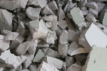 Broken concrete, Piles of lightweight construction bricks after house demolition