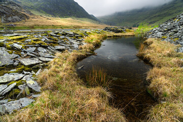 Eryri Snowdonia national park North Wales llyn Cwmorthin lake and old slate quarry