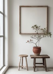 White framed poster in mockup style hanging from the wall