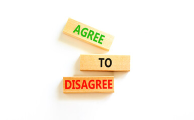 Agree to disagree symbol. Concept words Agree to disagree on beautiful wooden block. Beautiful white table white background. Business and agree to disagree concept. Copy space.