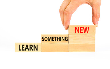 Learn something new symbol. Concept words Learn something new on beautiful block. Businessman's...