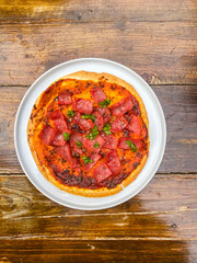An enticing serving of hearty salsa, showcasing vibrant colors and rich textures, ideal for enhancing any dish.