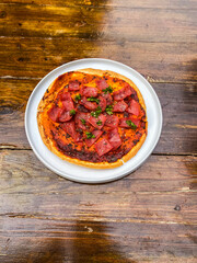 A delightful serving of salsa, showcasing its vibrant colors and fresh ingredients, ideal for any festive occasion.