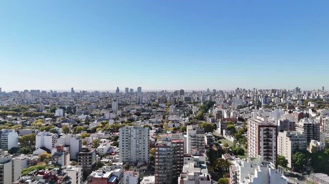 Aerial view from a drone at sunset from the neighborhood of Villa Urquiza in the city of Buenos Aires, Argentina.