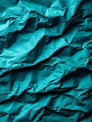 Fototapeta premium Crumpled Teal Paper Texture - Abstract background of teal crumpled paper. Perfect for design projects needing a textured look