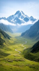 Winding mountain road through lush valley