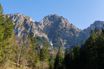 View from the Strazyska Valley towards a popular mountain hiking destination in Poland - the Giewont peak.