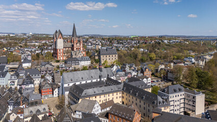 9 april 2025, Limburg an der Lahn, Germany. Aerial, drone view on the old city and view on the Cathedral, build on a rock formation. Some old houses and Limburg castle visible. River right side.