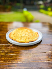 Close-up of a cheesy pasta creation, perfectly baked to golden perfection, highlighting its inviting texture.