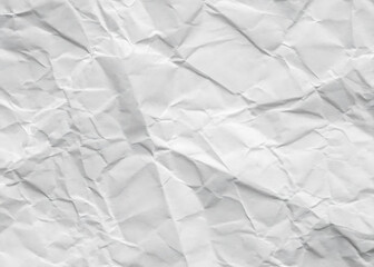 Fototapeta premium Crumpled white paper texture on a clean, blank surface, featuring wrinkles against a white background.
