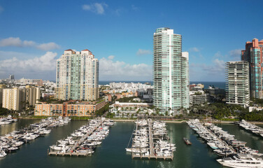 Obraz premium Miami south beach aerial view on luxury yacht marina with docked boat at sea