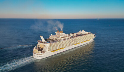 Aerial view of cruise in summer vacation. Cruise ship tour and travel at sea. Aerial view of luxury...