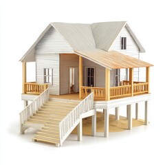 Miniature house model on stilts on white background