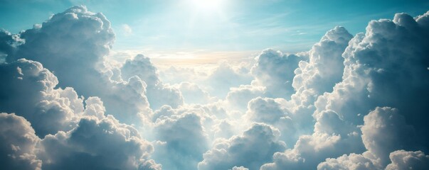 A vast expanse of fluffy clouds against a light blue sky.