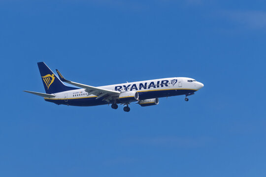 Faro, Portugal - april 16, 2025 : sign and logo on a Boeing 737-800 of Ryanair plane landing at Faro airport