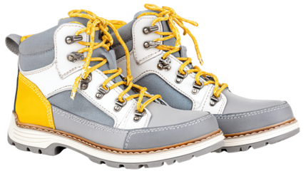 Pair of colorful hiking boots with yellow laces sit on a white surface.