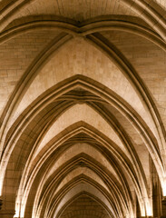 Detailed architectural arches of a historic stone structure, abstract, architecture