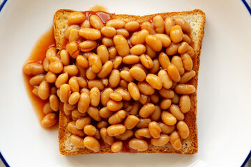 Homemade English Beans on Toast, top view. Close-up.