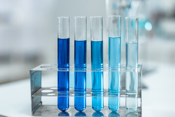 Chemical laboratory glassware with blue liquid samples in test tubes, scientific research experiment, biotechnology innovation, pharmaceutical analysis development, medical diagnostics