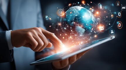 Businessman's hand interacting with futuristic holographic interface displaying data visualization and digital network in modern office environment.