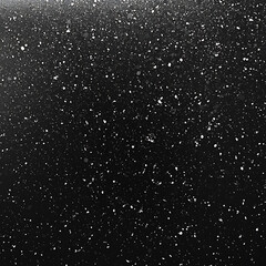 Obraz premium A textured surface with a black background speckled with irregularly spaced white dots and granules.