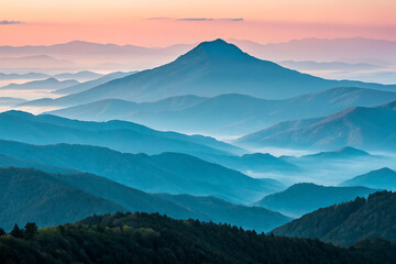 Obraz premium Serene sunset hues create a breathtaking panorama of rolling hills and mountains, forming a tranquil landscape bathed in soft pastel light. 