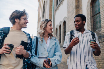 University students walking and talking on campus