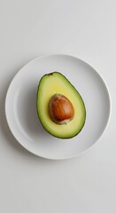 Sliced Avocado on White Ceramic Plate