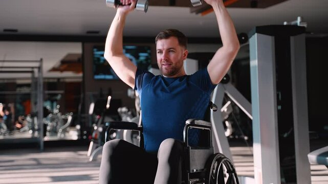 Man in wheelchair lifting weights at gym
