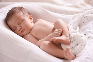 Bedtime. Cute little baby sleeping in lounger indoors
