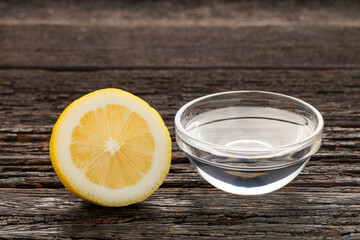 Water with yellow lemon - Citrus Limon
