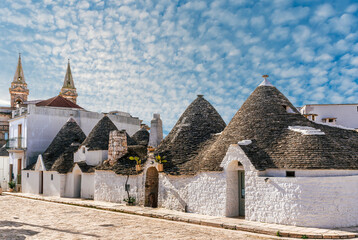 architecture composition of old vintage houses trulli in Italy. Traditional medieval house with...