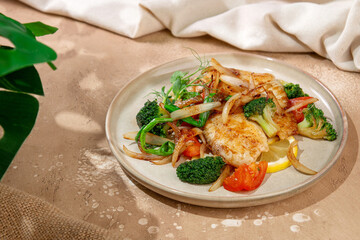 Grilled Fish Fillet with Broccoli and Fried Onions