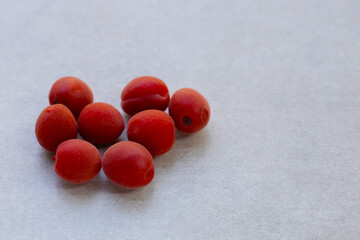 Umeboshi, Japanese pickled plums, Sour and salty taste.