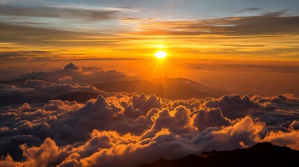 Sunrise over mountain cloudscape from high altitude, breathtaking view, ideal for travel or nature articles, prints, wallpaper