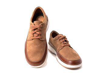 Men's suede Clarks shoes on a white background. Close-up.