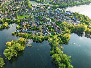 Aerial drone view of .Leybourne Lakes and housing estate, Aylesford, Kent, England
