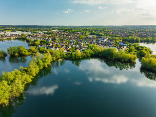 Aerial drone view of .Leybourne Lakes and housing estate, Aylesford, Kent, England