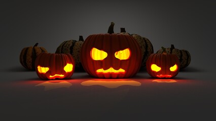 Pumpkins on a gray background with glowing orange eyes. Halloween. Halloween theme.