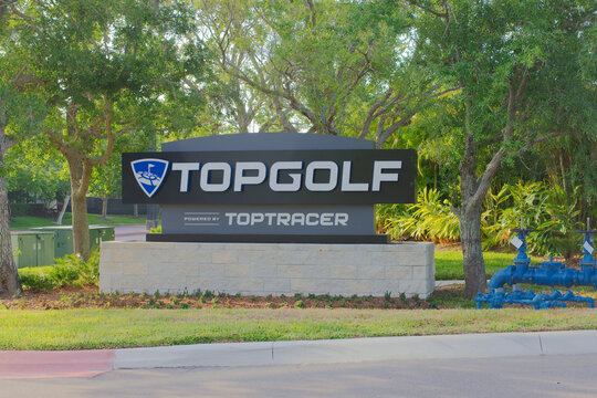 Editorial Use Only April 24, 2025,  St. Petersburg, FL, USA. Topgolf Saint Petersburg, FL USA sign. Early morning sunny day. 
