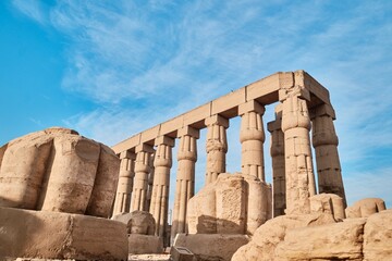Luxor, Egypt - December 26 2023: Columns of the Luxor Temple, a large Ancient Egyptian temple, East...