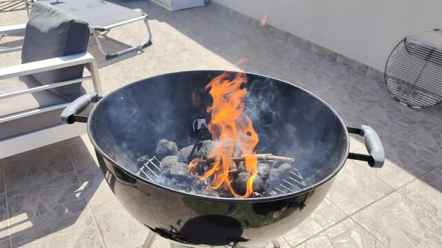 A black grill with a yellow object on it