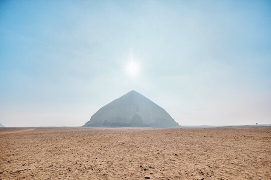 Saqqara, Egypt - January 2, 2024: The ancient Bent Pyramid of Dahshur for Pharaoh Snefru, near Cairo