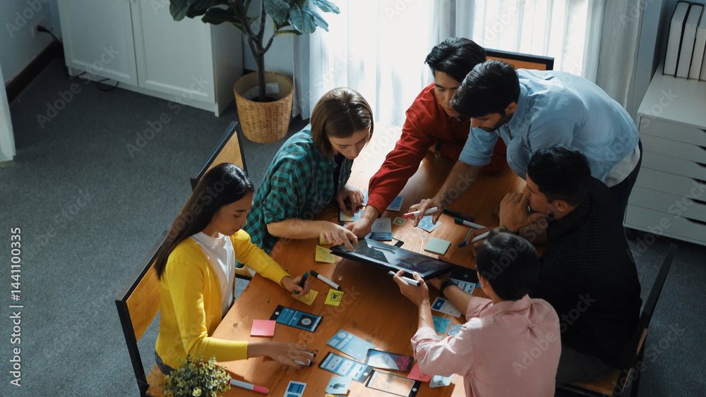 Wall mural top view of male leader present ux ui idea while standing at meeting. diverse startup manager in cas