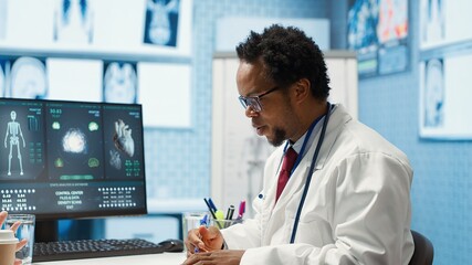 African american physician gives professional advice to woman patient, discussing about illness...