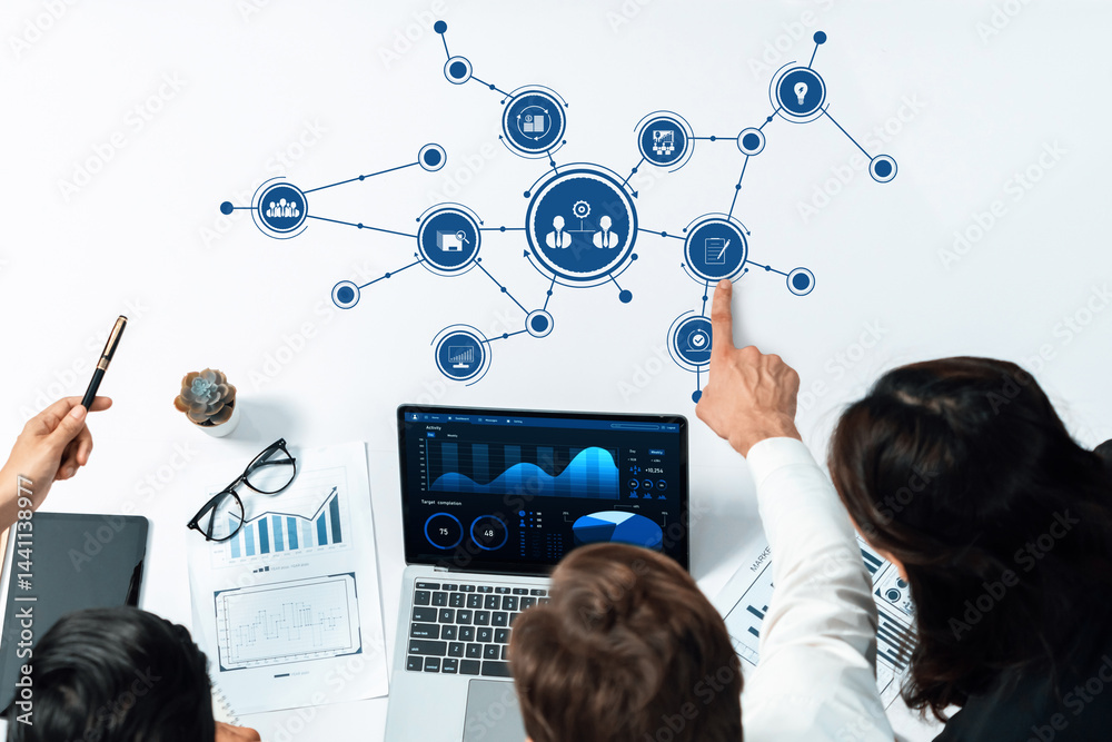 Leinwandbilder professionals engage in a collaborative business meeting, analyzing data visualizations and discussi