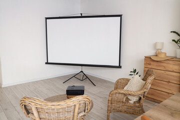 Interior of light room with armchairs and projector screen