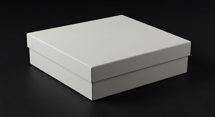 Fototapeta premium A Mockup of a Plain White Square Box on a Black Background. Perfect for Product Presentation and Branding.